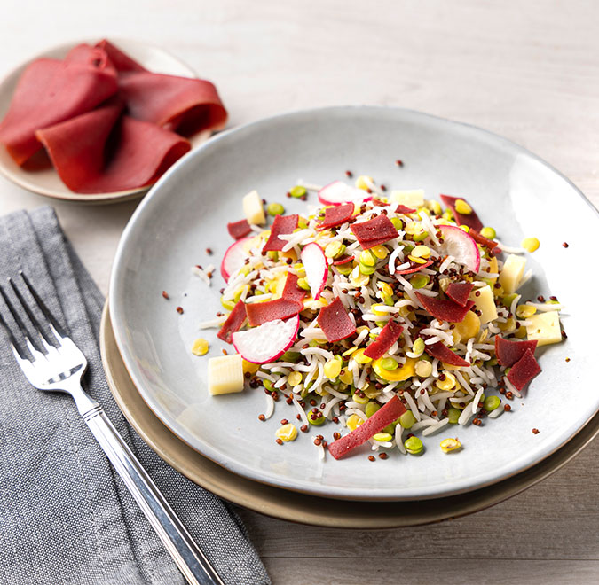 Grain salad with radish and cured cheese